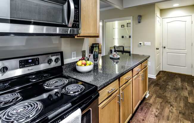 Kitchens with stainless steel appliances at The Larimore, Omaha, 68164