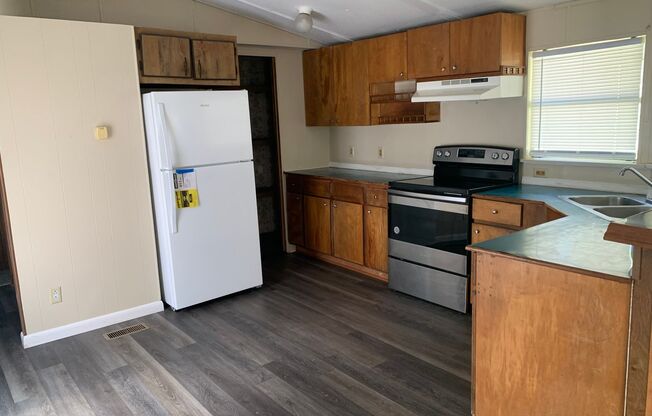Available Now - Spacious 2 Bedroom + Bonus Room, 2 Bath Mobile Home
