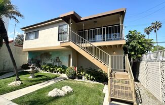 Stunning 2nd Floor Duplex in Back of Property with Private Access and Ocean Views