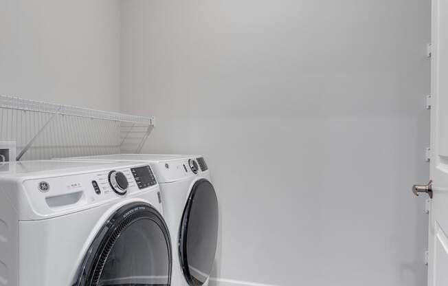 Walk-In Closet With Full-Sized Washer & Dryer