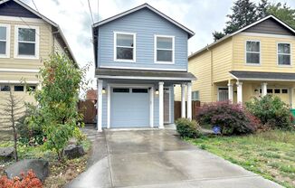 Spacious Mill Park 2-Level Single Family Home with Fenced Backyard