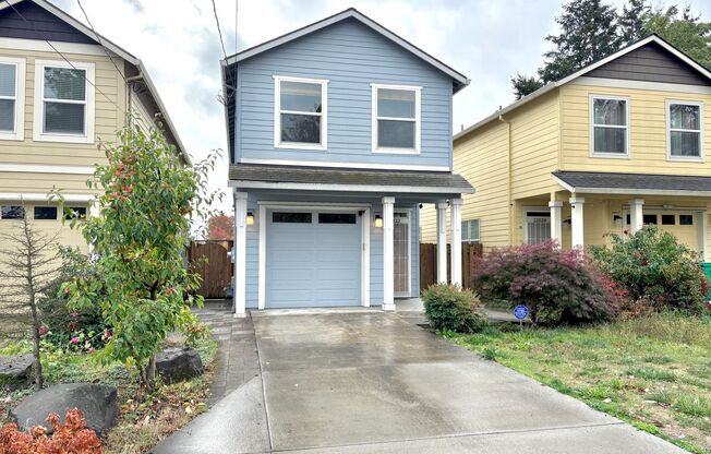 Spacious Mill Park 2-Level Single Family Home with Fenced Backyard