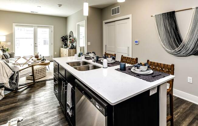 Large kitchens with quarts countertops and stainless steel appliances at The Westline at Flanagan Lake in Omaha, NE