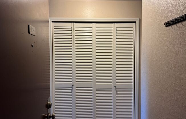 Serene Ground-Floor Condo Overlooking Green Space – Parking Included