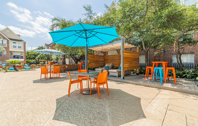 outdoor tables and chairs with umbrella shades
