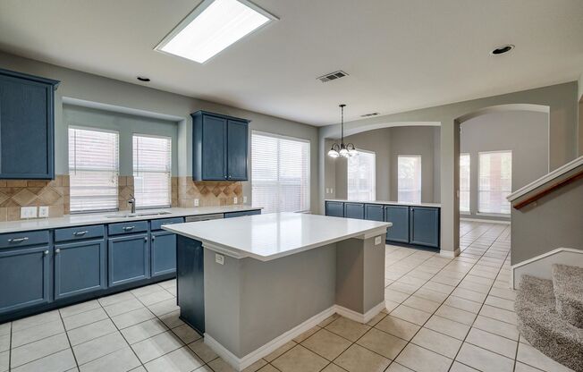 Spacious 4 bedrm with 3 bath, and 2 living area home and Game rm. Tile entry which leads all the way into a spacious kitchen