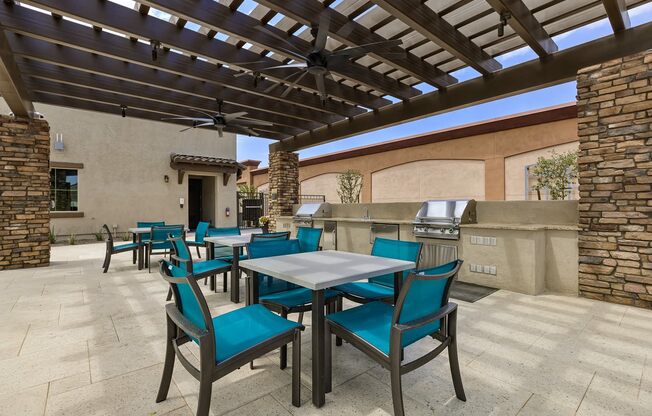 Outdoor BBQ Grill with Intimate Seating Area at Pillar Lago