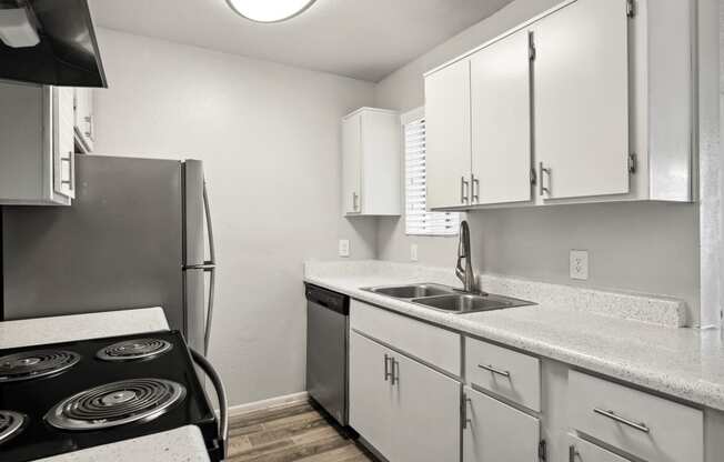 the preserve at ballantyne commons apartment kitchen with stainless steel appliances