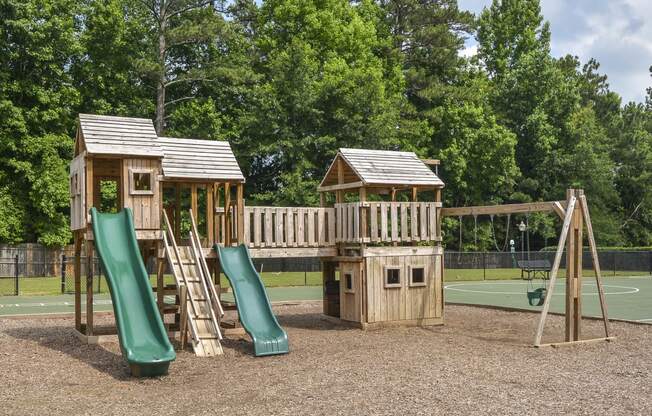Play area at Harvard Place Apartment Homes by ICER, Lithonia, Georgia