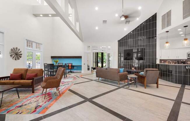 A modern living room with a black and white checkered floor.