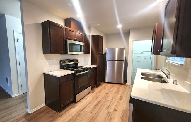 Fully Renovated Townhomes! Brand New Stainless Steel Appliances! & Bonus Area!