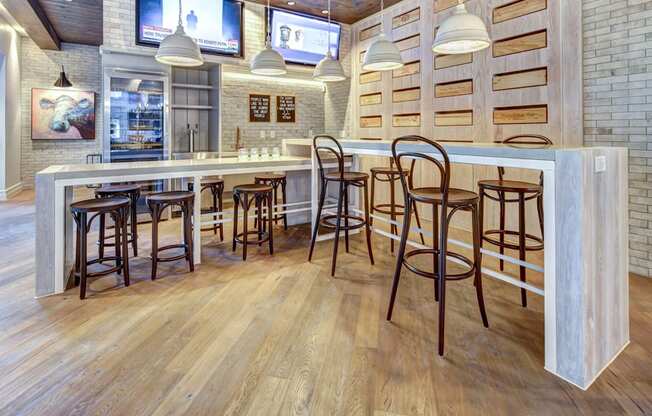 Clubhouse Kitchen Breakfast Bar with Stools at The Alden at Cedar Park, Cedar Park, TX