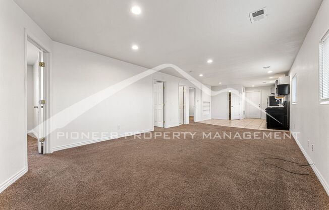 Lower Level Half Duplex with Two Car Garage and Fenced Yard