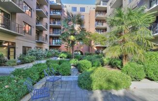 1 Bed/1 Bathroom Condo in Pearl district ~ Covered Balcony, Atrium views and Gated Garage!