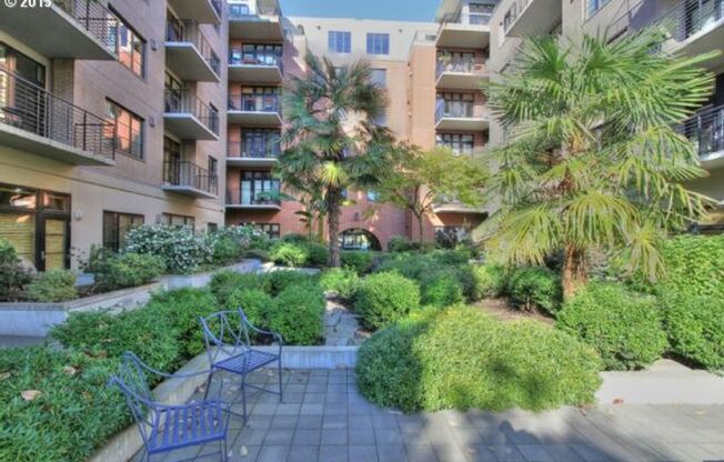 1 Bed/1 Bathroom Condo in Pearl district ~ Covered Balcony, Atrium views and Gated Garage!