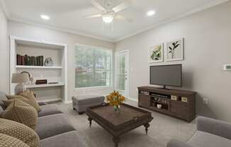 a living room with a couch and a tv