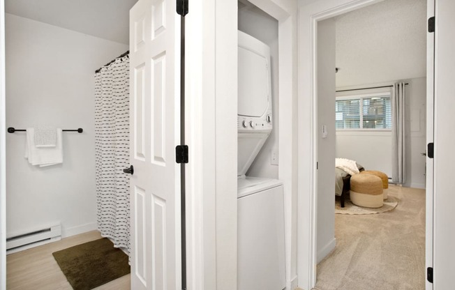 an open closet with a washer and dryer in a home at Brix, Walla Walla