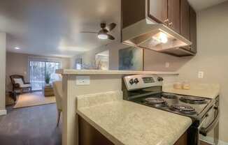 Electric Range In Kitchen at Hangar 128 Apartments, Washington, 98204