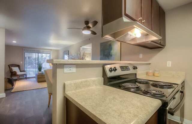 Electric Range In Kitchen at Hangar 128 Apartments, Washington, 98204