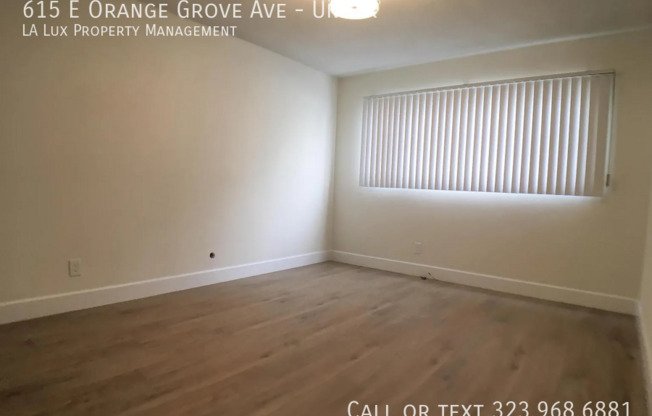 615 E ORANGE GRV AVE