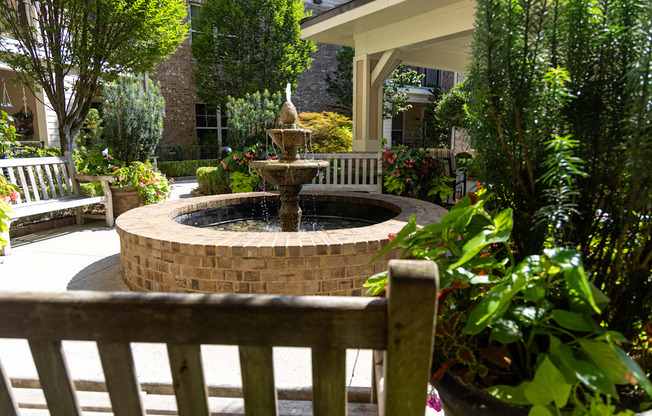 a fountain in front of a building