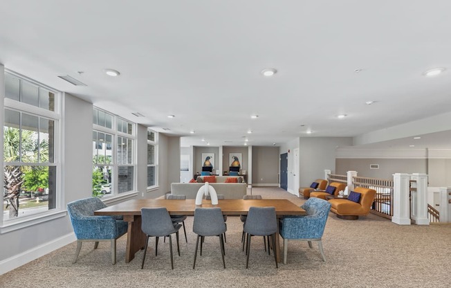resident lounge with a large table and chairs