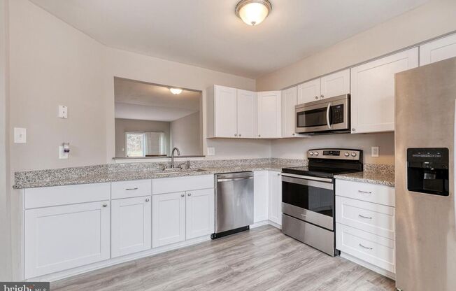 Welcome to 3 Greenshire Lane, a 3bd 2/2bth townhome in the sought after Owings Mills community of Garrison Woods