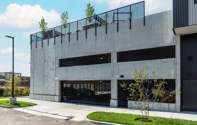 Steelcote Flats exterior gated garage parking at Steelcote Square, Missouri