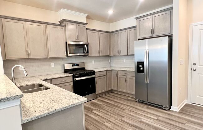 Like-New Townhome Walk to Downtown | Garage + Internet Included