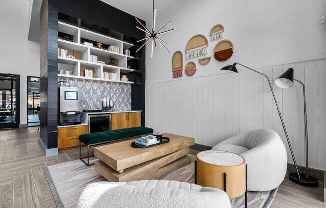 a living room filled with furniture and a large window