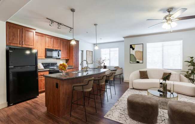 a kitchen and living room with a large island