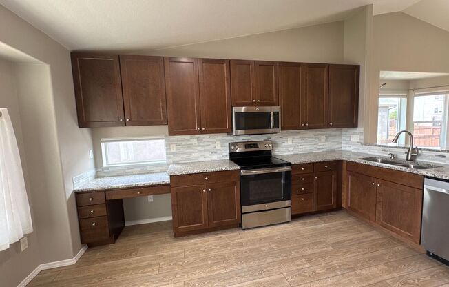 Beautiful stucco 4 bed rancher on premium fully landscaped lot