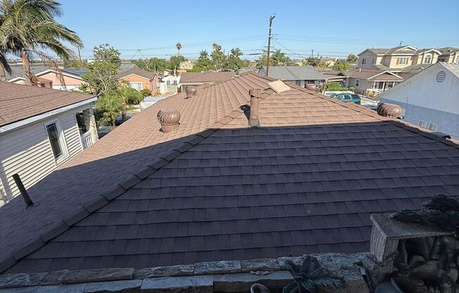 4 bed 3 bath plus 2 Extra Bonus Rooms with full bathroom in the back yard