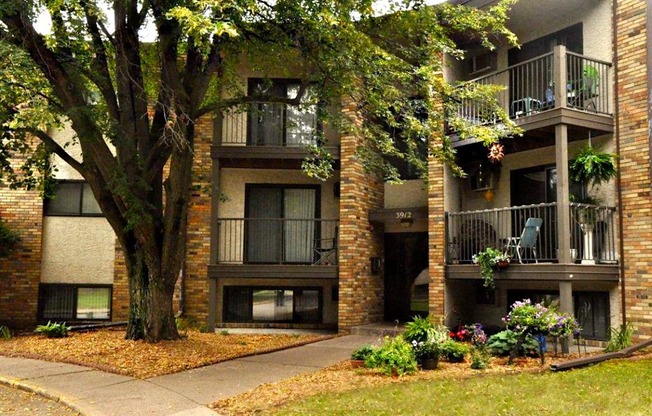 White Bear Lake, MN White Bear Terrace Apartments.  an apartment building with a large tree in front of it