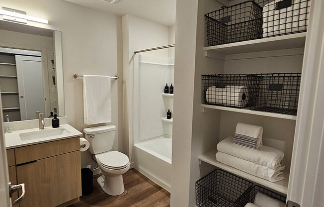 a bathroom with shelves at Lotus Republic Apartments for rent in Downtown Salt Lake City, Utah