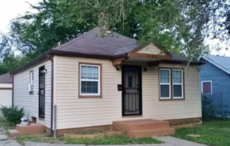 2 Bedroom Home with unfinished basement and detached garage in Northeast Wichita