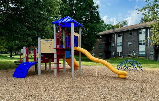 Playground with a slide at Deer Park Apartments, Randallstown, MD