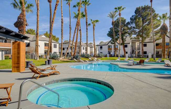 take a dip in the hot tub at villas at houston levee west apartments in