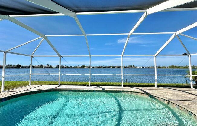 Beautiful Waterfront 3 Bed 2 Bath Home With Heated Pool, Washer/Dryer In Unit & More!