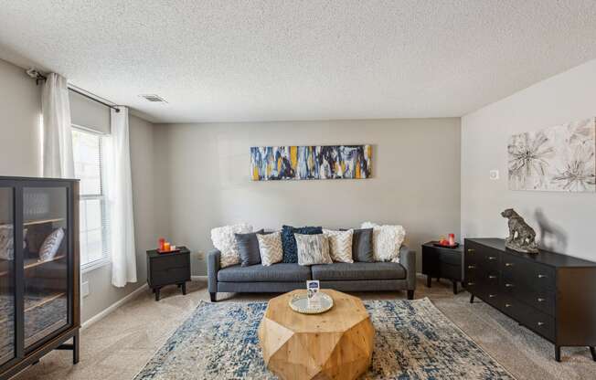 a living room with a couch and a coffee table
