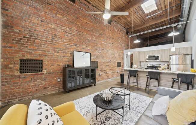 a living room with a couch and a table