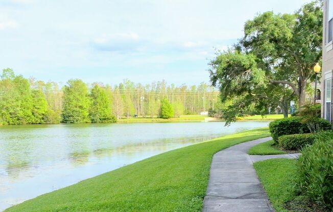 Beautiful WATER VIEW 3 bedroom, 2 bathroom condo in the peaceful gated community of Capri at Hunter's Creek !!!