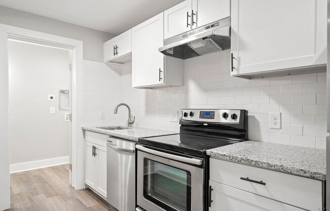 Renovated Kitchen Stainless Steel Appliances Granite Countertops Soft Close Cabinetry