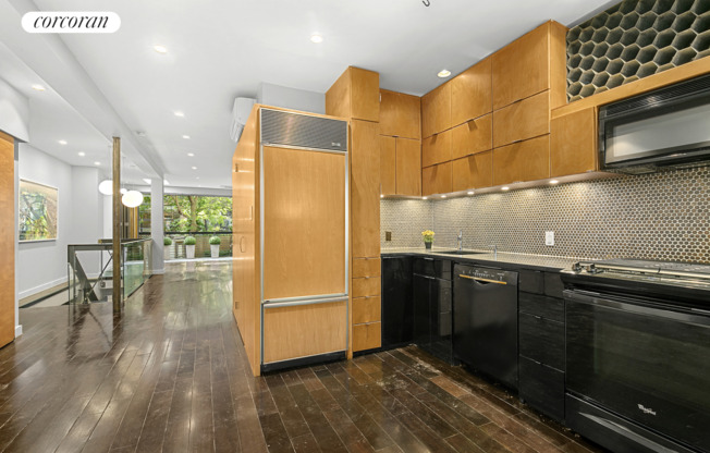 448 W 25 ST