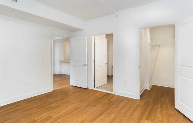 Bedroom with Hard Surface Flooring and Walk-In Closet