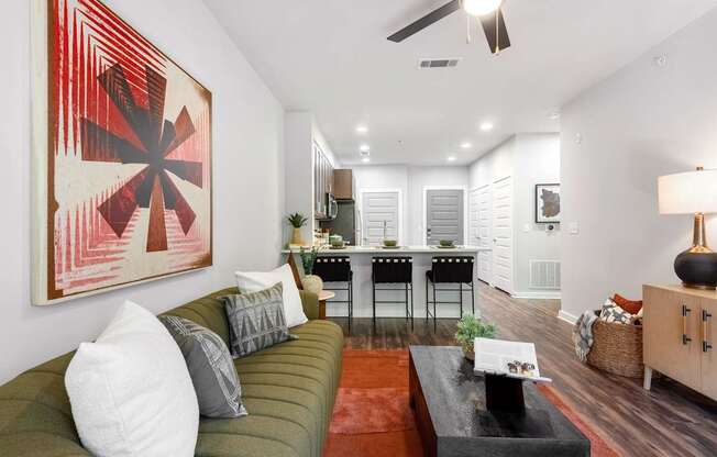 Modern Living Area with Colorful Touches and Seamless Kitchen Access