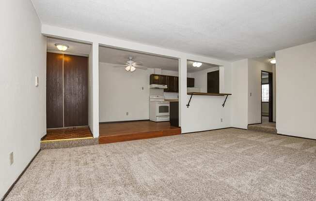 Fridley, MN Georgetown Apartments. A living room with a couch and a chair