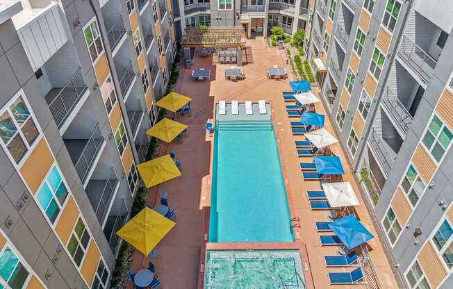 an overhead view of a swimming pool in the middle of a building