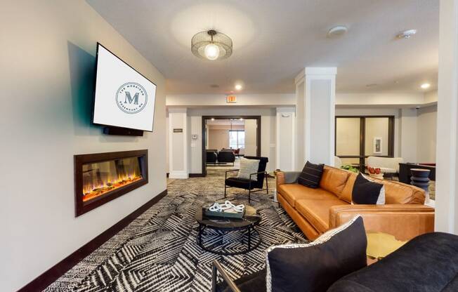 a living room filled with furniture and a fire place