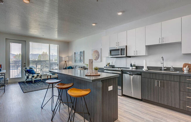 Model apartment home kitchen/island and living room